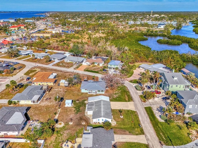 105 Crestview Dr, Englewood, FL 34223 - aerial overview of property's location with a nearby body of water and nearby suburban area