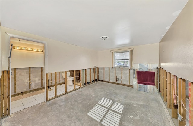 105 Crestview Dr, Englewood, FL 34223 - spare room featuring concrete floors