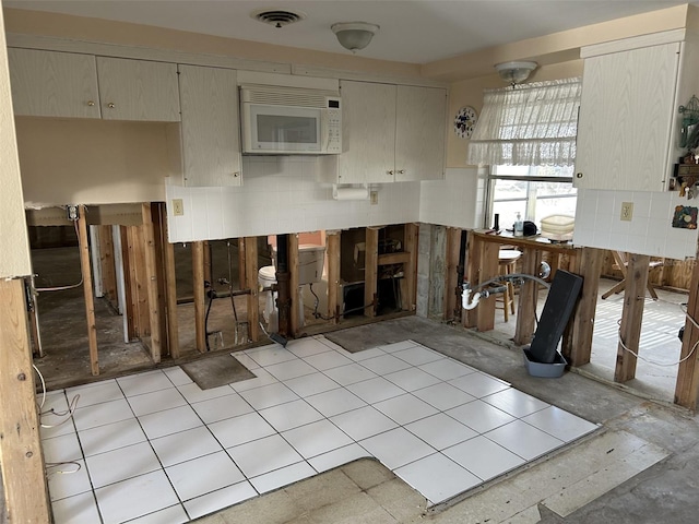 105 Crestview Dr, Englewood, FL 34223 - kitchen with white microwave