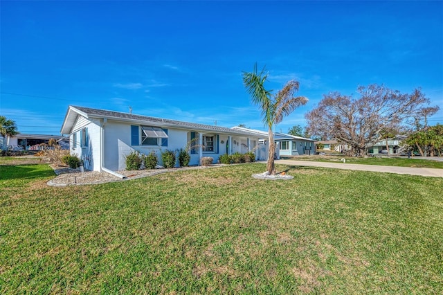 ranch-style house with a front yard