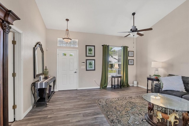 foyer entrance featuring ceiling fan and dark hardwood / wood-style floors