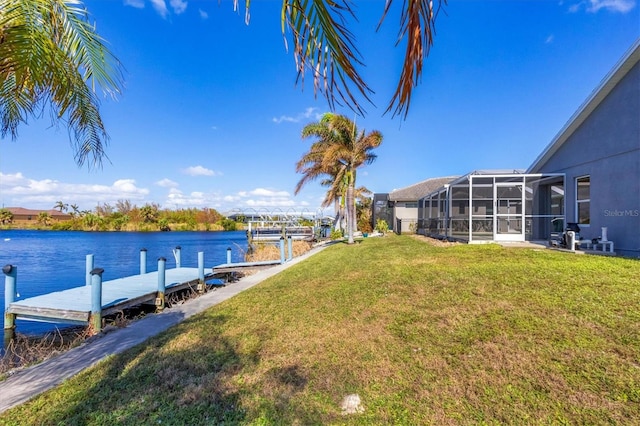 view of dock featuring glass enclosure, a water view, and a yard