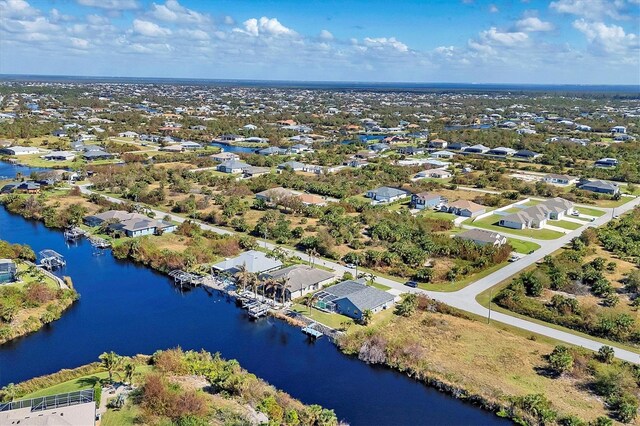 10083 Kansas City St, Port Charlotte, FL 33981 - aerial view of residential area featuring a large body of water