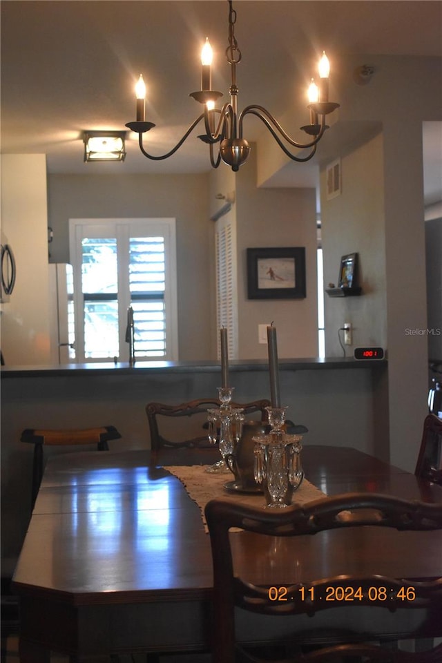 dining room featuring an inviting chandelier