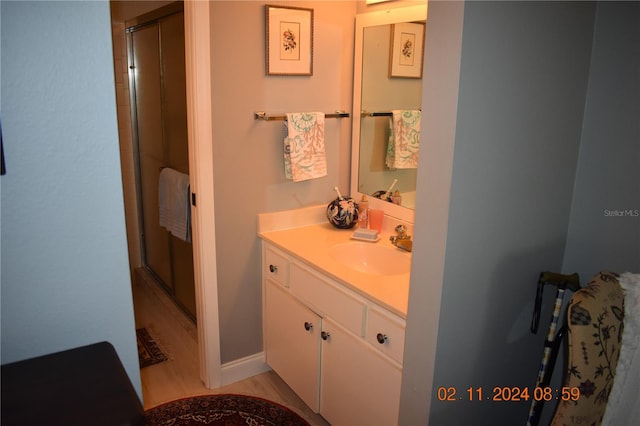 bathroom with vanity and walk in shower