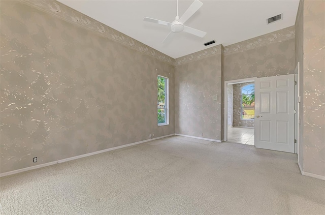 unfurnished room featuring ceiling fan