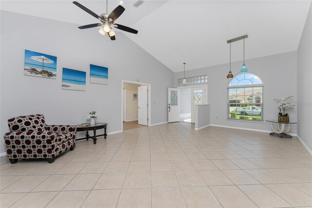 110 Abercrombie Ave, Englewood, FL 34223 - living room featuring high vaulted ceiling, ceiling fan, light tile patterned floors, and baseboards