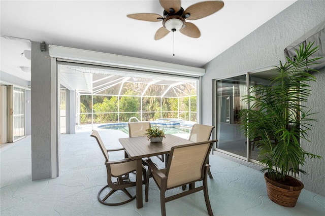 dining room featuring lofted ceiling and ceiling fan