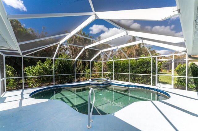 110 Abercrombie Ave, Englewood, FL 34223 - view of pool with a patio, a pool with connected hot tub, and glass enclosure