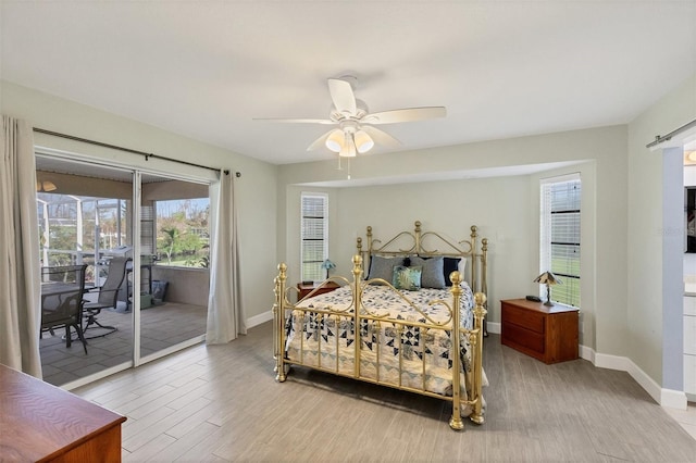 bedroom with light wood-type flooring, access to exterior, and ceiling fan