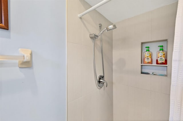 bathroom featuring curtained shower