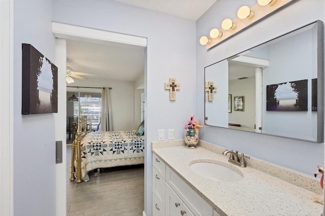 bathroom featuring vanity and ceiling fan