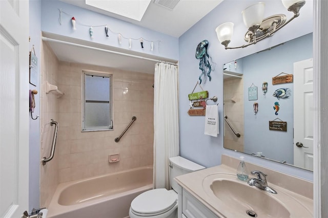 full bathroom with vanity, toilet, and shower / bath combo with shower curtain