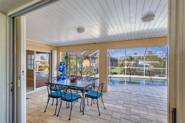 sunroom with wood ceiling