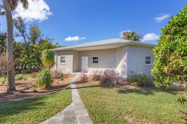 view of front of house with a front yard