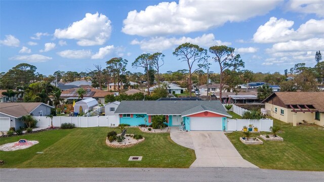 single story home with a garage and a front yard