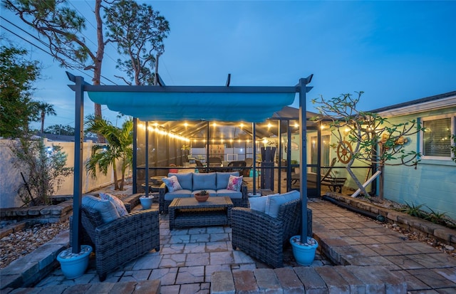 patio terrace at dusk featuring an outdoor hangout area