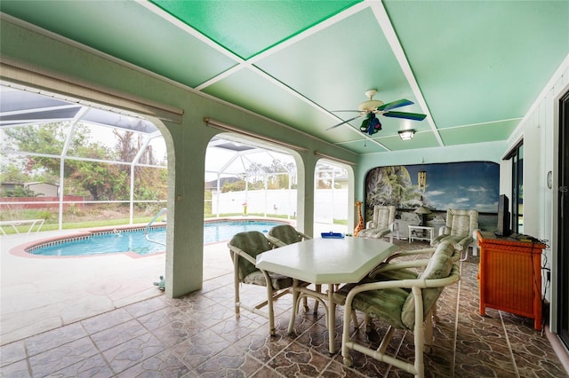 exterior space featuring a lanai and ceiling fan