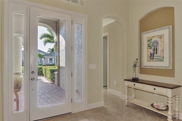 entrance foyer with light tile patterned floors