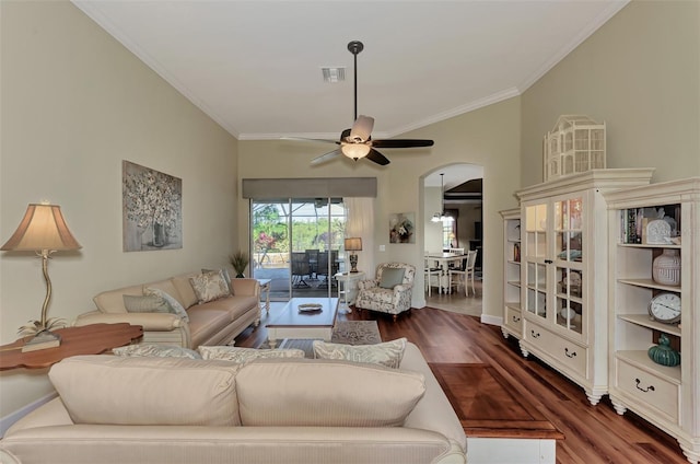 living room featuring dark hardwood / wood-style flooring, ornamental molding, and ceiling fan