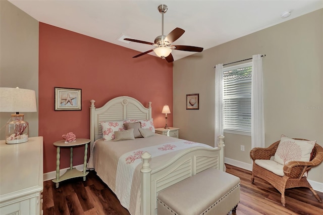 bedroom featuring ceiling fan and wood-type flooring