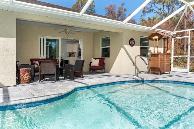 152 Apollo Dr, Rotonda West, FL 33947 - swimming pool featuring a patio area, ceiling fan, a lanai, and outdoor dining space
