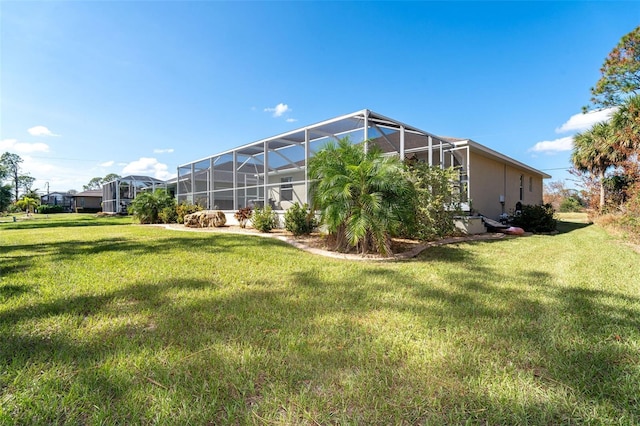 152 Apollo Dr, Rotonda West, FL 33947 - surrounding community with a lawn