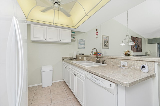 kitchen with white appliances, sink, decorative light fixtures, white cabinetry, and kitchen peninsula