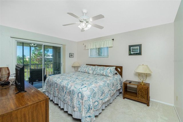 bedroom featuring access to exterior, ceiling fan, and light carpet