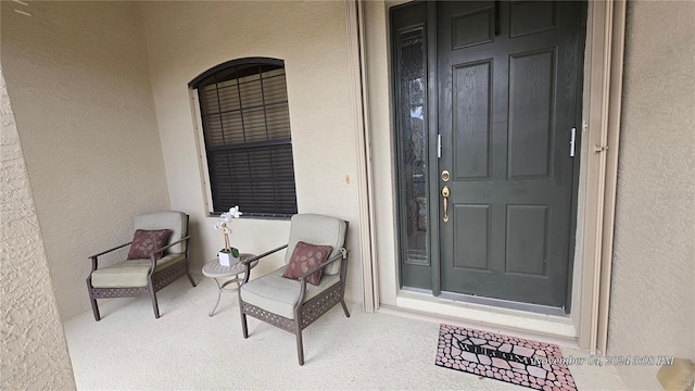 entrance to property with covered porch