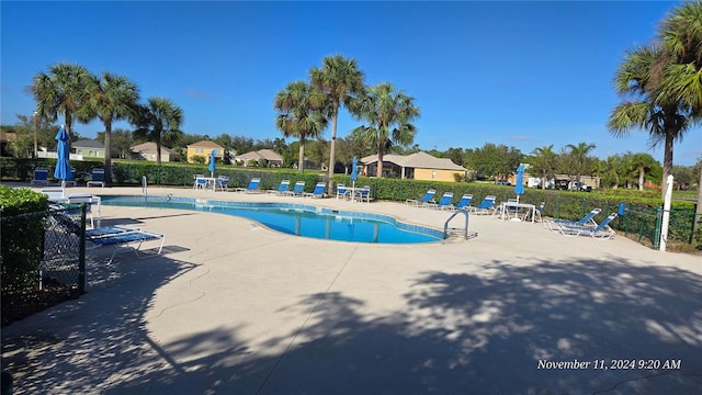 view of pool featuring a patio