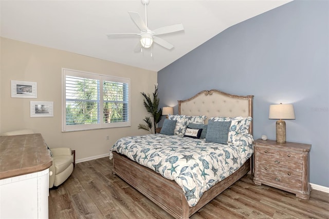 bedroom featuring lofted ceiling, hardwood / wood-style flooring, and ceiling fan