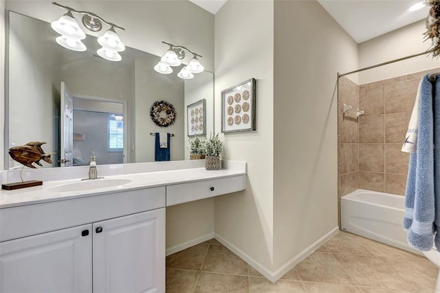 bathroom with vanity, tiled shower / bath combo, and tile patterned floors