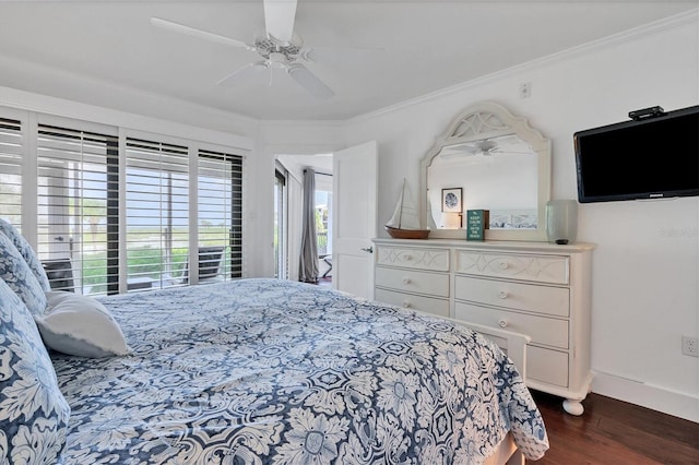 bedroom featuring ceiling fan, crown molding, and dark hardwood / wood-style floors