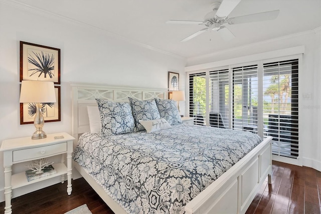 bedroom featuring ceiling fan, dark hardwood / wood-style flooring, and crown molding