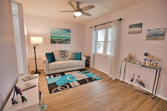 interior space featuring hardwood / wood-style floors and ceiling fan