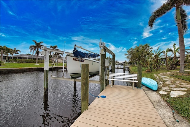 dock area with a water view