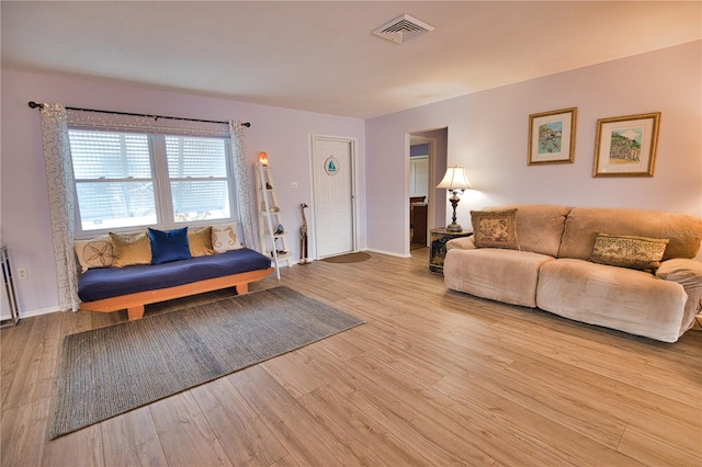 living room featuring light wood-type flooring