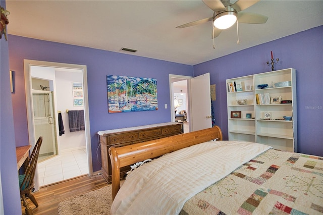 bedroom with ceiling fan and wood-type flooring