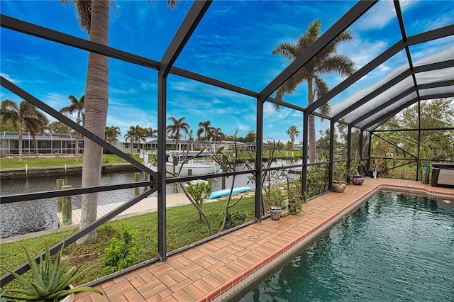 view of swimming pool featuring a boat dock, a water view, and glass enclosure