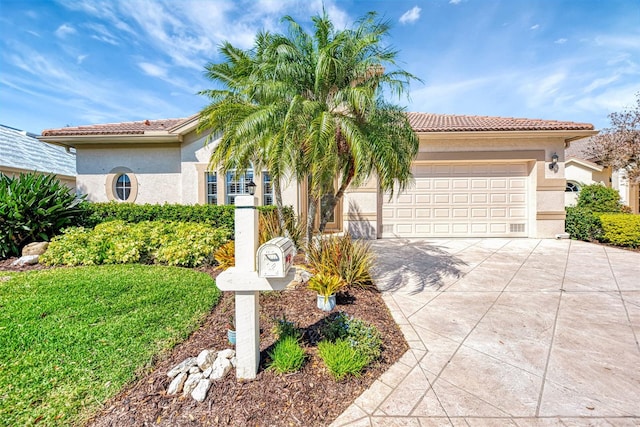 mediterranean / spanish-style home with a garage