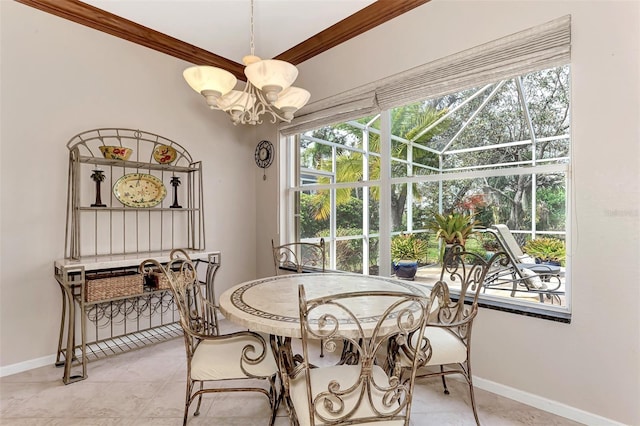 tiled dining space featuring an inviting chandelier and crown molding