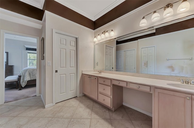 bathroom with vanity and crown molding