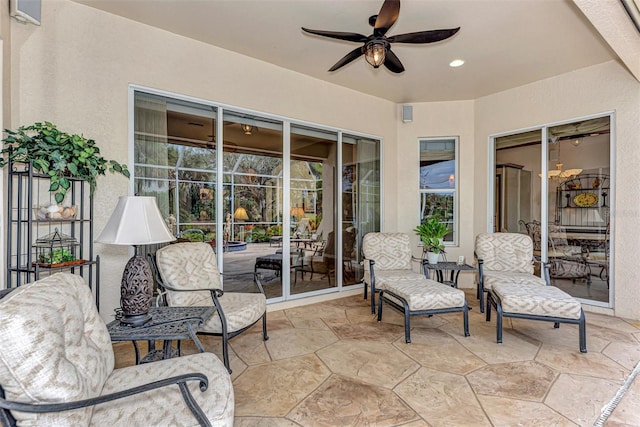 view of patio featuring ceiling fan