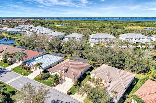 drone / aerial view with a water view