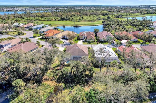 bird's eye view with a water view