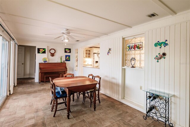 dining space with ceiling fan