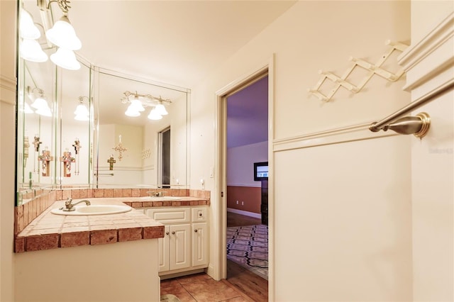 bathroom with vanity and tile patterned floors