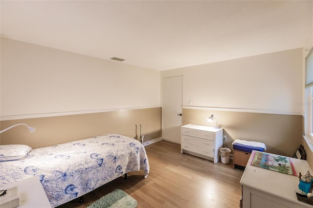 bedroom featuring light hardwood / wood-style floors