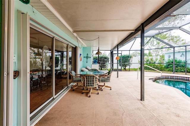 view of pool featuring a lanai and a patio area